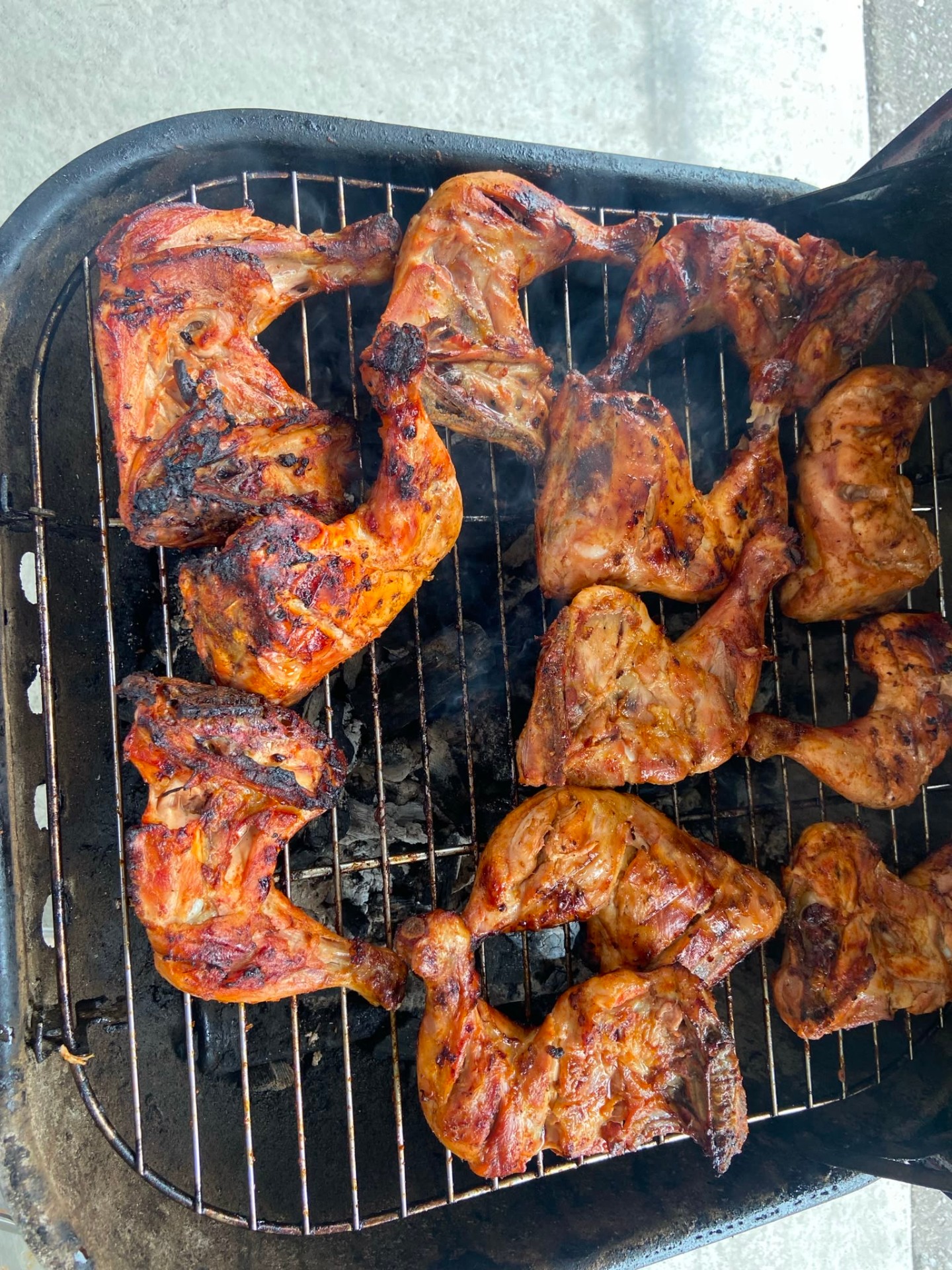 Charcoal-grilled chicken on the grate